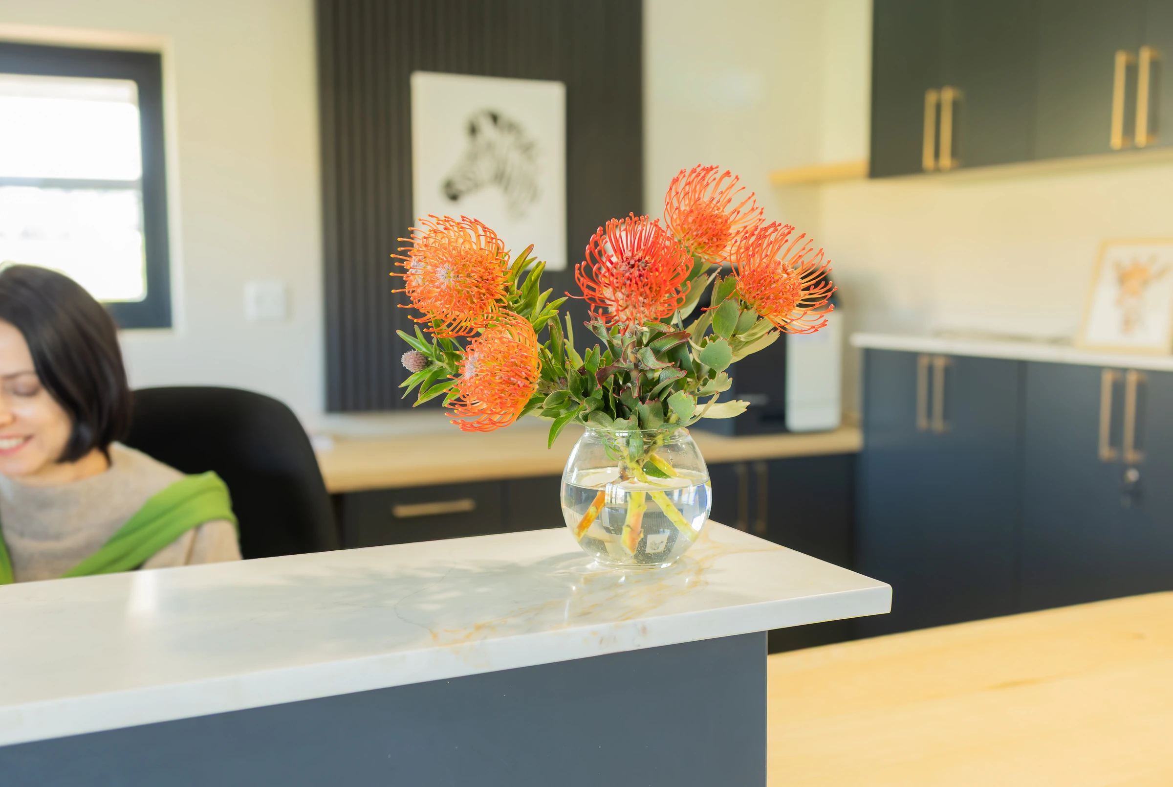 King's College reception desk with flowers