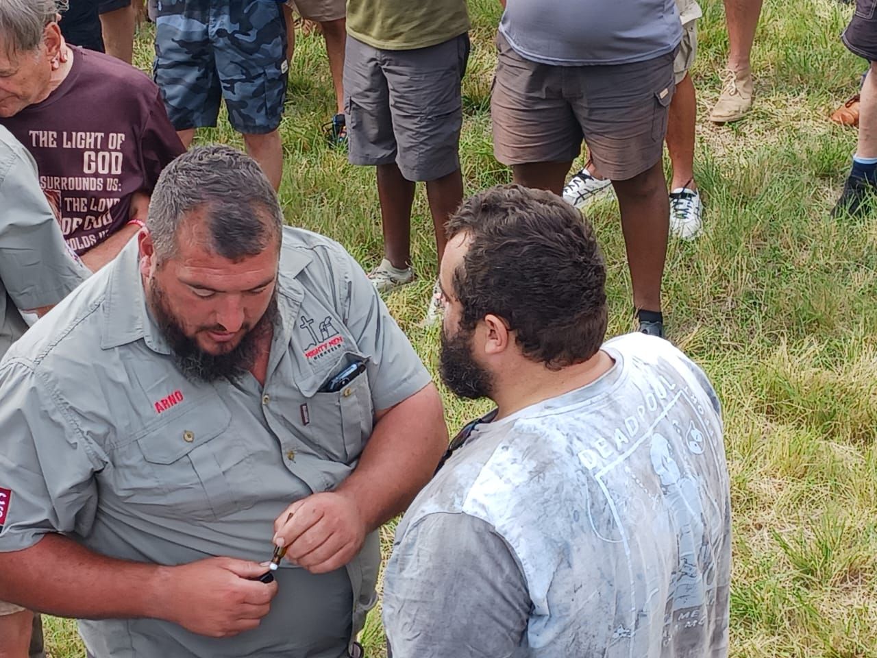 Two men praying together